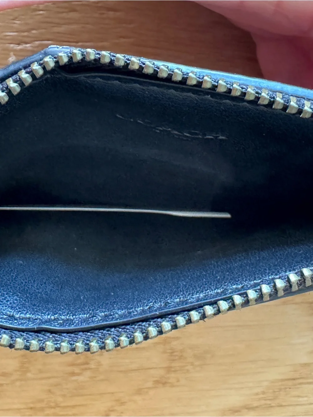 Coach slim zip